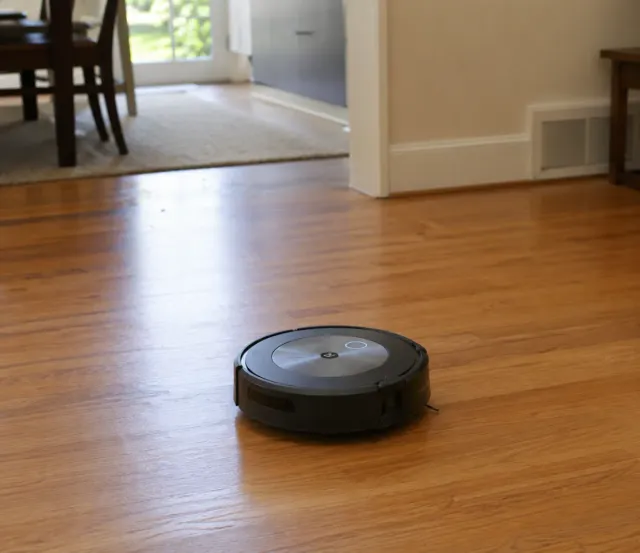 iRobot Roomba j7+ robot vacuum on a self-empty dock